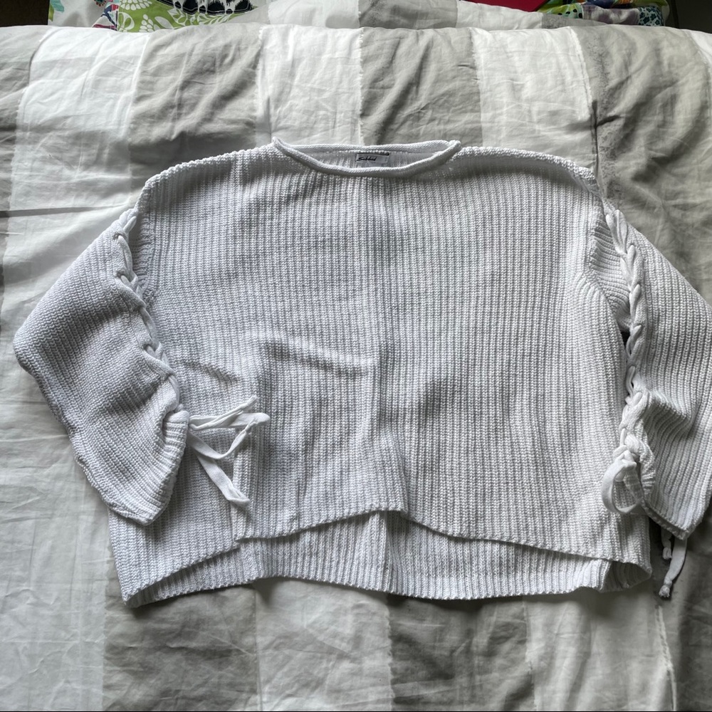 White subdued sweater